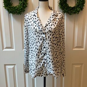 Women’s size medium blouse. NWOT never worn.